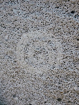 Texture of aerated concrete. What\'s inside a building block? White aerated concrete texture or background