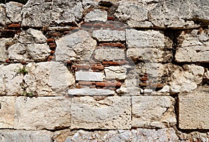 Texture of ancient stone wall at Acropolis, Athens, Greece