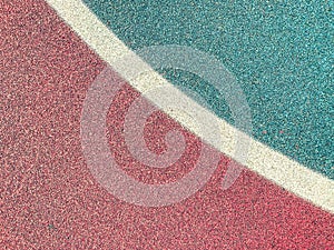 Texture, background, basketball field. anti-slip coating for a sports field made of rubberized material. There are markings on the