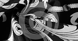 Texture, background, black silk fabric with a monogram pattern Exquisite pattern of filigree fabric your design will delight you