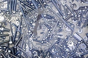 Texture background of custom hex head bolt and wrench thread on tray