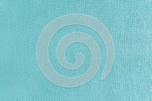 Texture background of cyan velours fabric, cloth surface, weaving of jacquard material