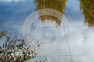Texture background of fabric. Spring landscape, a puddle of melt
