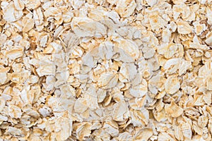 Texture background Heap of rolled oats. Closeup. Top view photo