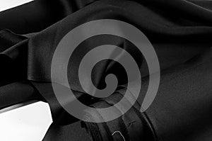 Texture. Background. Pattern. Black fabric for cutting clothes.