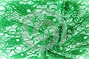 Texture, background, pattern. Cloth green lace. Background of fa