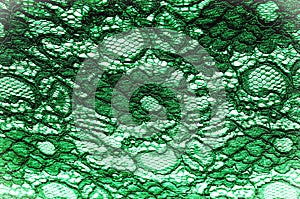 Texture, background, pattern. Cloth green lace. Background of fa