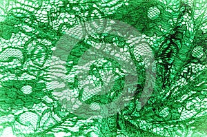 Texture, background, pattern. Cloth green lace. Background of fa