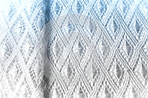 Texture background pattern. Lacy white fabric. Handmade lace on