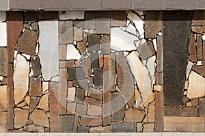 Texture, background, pattern. Lining of the old pool. Granite slabs in mosaic. Granite marble patterned background texture marble