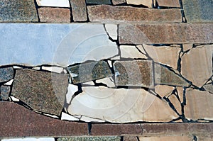 Texture, background, pattern. Lining of the old pool. Granite slabs in mosaic. Granite marble patterned background texture marble