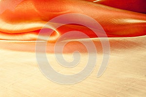 Texture, background, pattern. Orange Silk Fabric for Drapery Abs