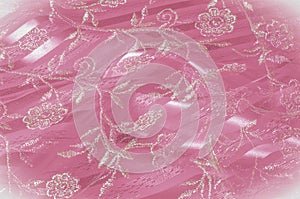 Texture, background, pattern. Pink lace decorated with flowers o