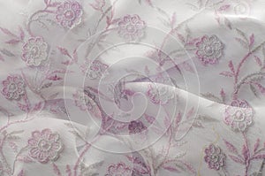 Texture, background, pattern. Pink lace on white background. Pin