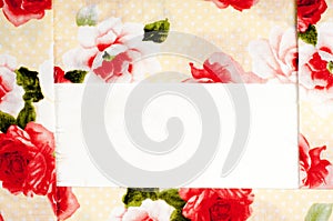 Texture, background, pattern. Silk fabric is beige with red rose