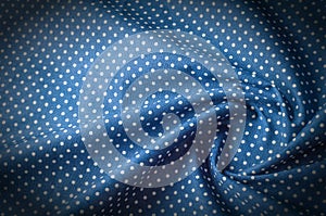 Texture background pattern. Silk fabric, blue cloth in white pea