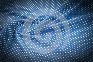 Texture background pattern. Silk fabric, blue cloth in white pea