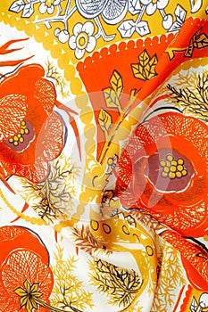 Texture, background, pattern. Silk fabric - red white yellow flo