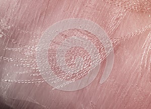 Texture, background, pattern. Tulle of pastel pink tones. Abstract background of pink fabric. Soft texture of the fabric, pink pa