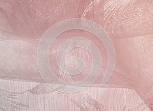 Texture, background, pattern. Tulle of pastel pink tones. Abstract background of pink fabric. Soft texture of the fabric, pink pa