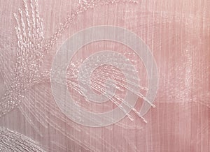 Texture, background, pattern. Tulle of pastel pink tones. Abstract background of pink fabric. Soft texture of the fabric, pink pa