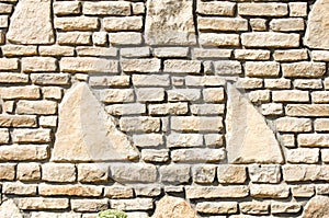 Texture background, pattern. The wall is stone. Architecture. Co