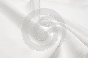 Texture background pattern. White silk fabric. Closeup of a rippled white silk fabric. Advertising space. Smooth elegant white si