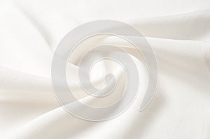 Texture background pattern. White silk fabric. Closeup of a rippled white silk fabric. Advertising space. Smooth elegant white si