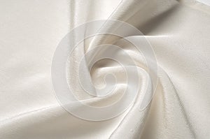 Texture background pattern. White silk fabric. Closeup of a rippled white silk fabric. Advertising space. Smooth elegant white si