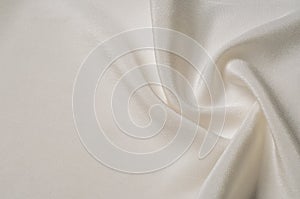 Texture background pattern. White silk fabric. Closeup of a rippled white silk fabric. Advertising space. Smooth elegant white si