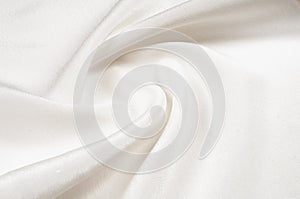 Texture background pattern. White silk fabric. Closeup of a rippled white silk fabric. Advertising space. Smooth elegant white si