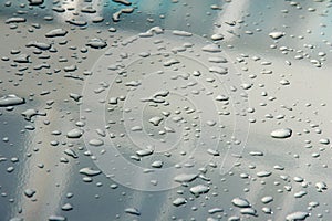 Texture background. raindrops on paintwork. Precipitation in the