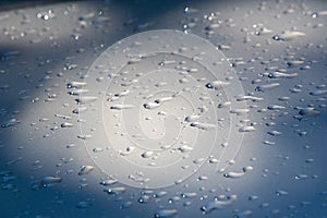 Texture background. raindrops on paintwork. Precipitation in the