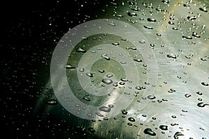 Texture background. raindrops on paintwork. Precipitation in the