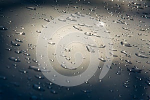 Texture background. raindrops on paintwork. Precipitation in the