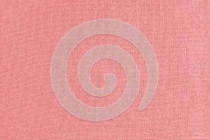 Texture background of red cotton fabric, cloth surface, weaving of linen fabric