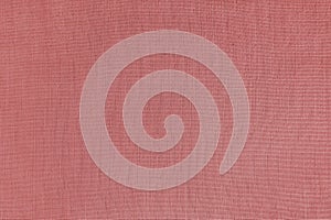 Texture background of red linen fabric, cloth surface, weaving of natural cotton fabric