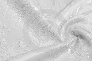Texture background Silk fabric Black white color Luxurious soft silk hand is a black and white paisley pattern In fact seal