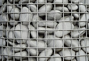 Texture background stones under the metal grid. Natural pattern 2