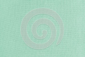 Texture background of turquoise cotton fabric, cloth surface, weaving of linen fabric