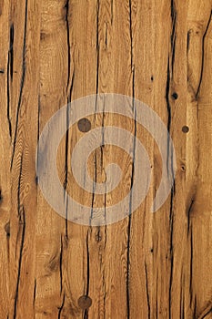 Texture and background of a very old cracked brown wood after protective treatment, vertical design for social networks