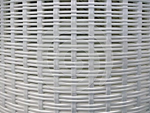 The texture of the baskets from the white plastic background