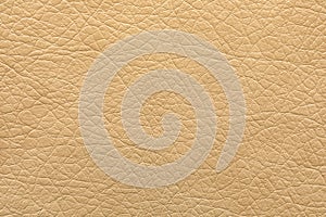 Texture of beige leather as background, closeup