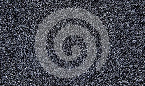 Texture of a black carpet. Background of wool.