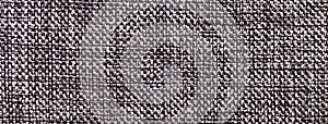 Texture of black and white color background from woven textile material with wicker pattern, macro