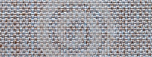 Texture of blue and brown color background from woven textile material with wicker pattern, macro