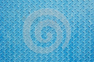 Texture of blue-colored corrugal iron. Light blue background.