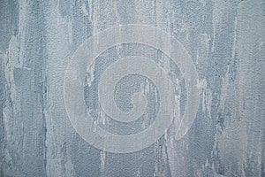 Texture blue gray plastered wall for background. Texture of a gray concrete wall. Rough painted concrete wall texture