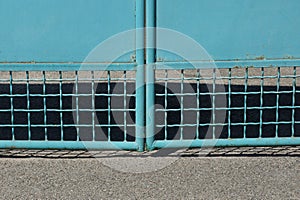 Texture of blue iron grille on metal gates