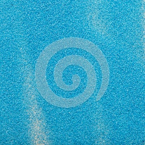 Macro shot of blue sand